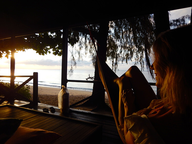 watching the sunset from my bungalow right at the beach in Malaysia on Tioman island
